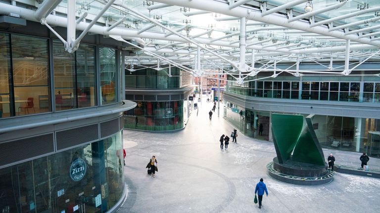 People walk through a largely empty shopping centre in Victoria, central London. The UK�s economy shrunk at its fastest rate since the 1920s last year, as the pandemic forced thousands of businesses to remain closed for several months. Picture date: Friday February 12, 2021.