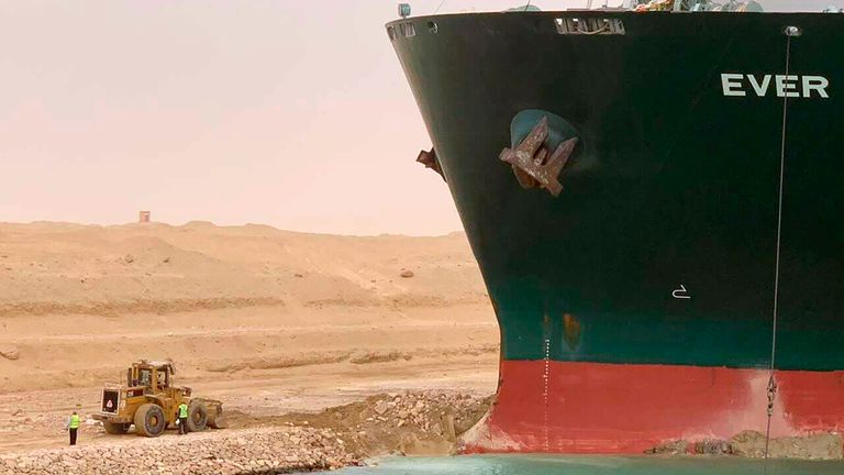 In this photo released by the Suez Canal Authority, a cargo ship, named the Ever Given, sits with its bow stuck into the wall Wednesday, March 24, 2021, after it become wedged across Egypt’s Suez Canal and blocked all traffic in the vital waterway. Pic: AP