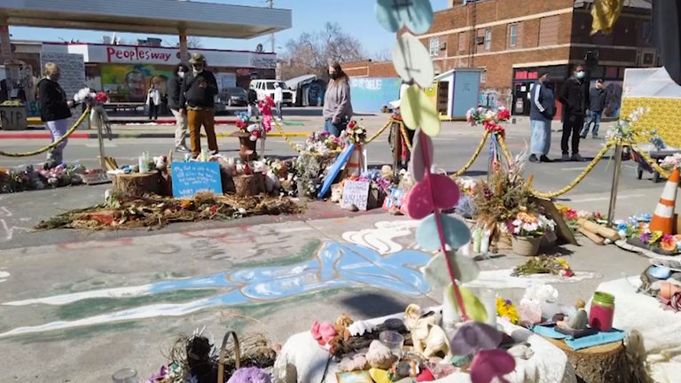 Many mourners have left tributes at the location George Floyd died