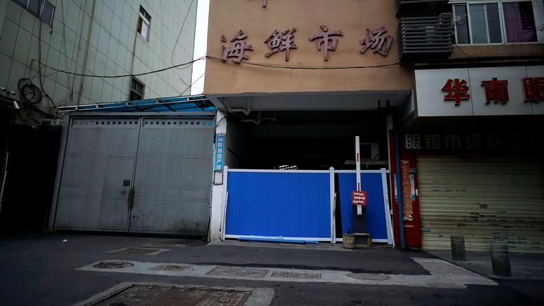 A blocked entrance to huanan seafood market, where COVID-19 is believed to have first surfaced