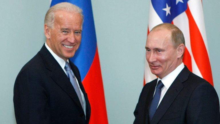 FILE - In this March 10, 2011, file photo, then-Vice President Joe Biden, left, shakes hands with Russian Prime Minister Vladimir Putin in Moscow, Russia. Russia and the United States exchanged documents Tuesday Jan. 26, 2021, to extend the New START nuclear treaty, their last remaining arms control pact, the Kremlin said. The Kremlin readout of a phone call between U.S. President Joe Biden and Russian President Vladimir Putin said they voiced satisfaction with the move. (AP Photo/Alexander Zeml