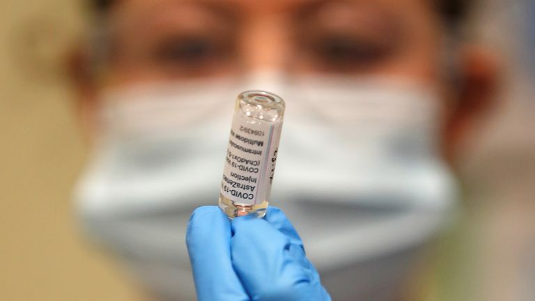 Nurse and Clinical Pod Lead, Lily Harrington prepares to administer a dose of the Oxford/AstraZeneca COVID-19 vaccine to Britain&#39;s Prime Minister Boris Johnson, amid the coronavirus disease pandemic, in London, Britain March 19, 2021. Frank Augstein/Pool via REUTERS