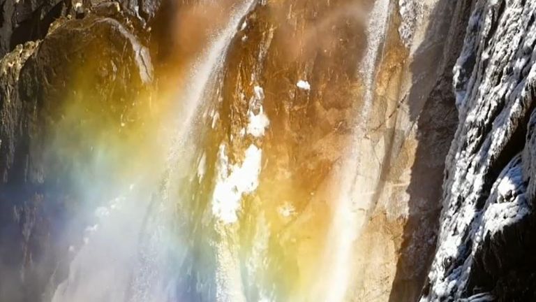 Lower Yosemite Falls lit up with natural coloured light