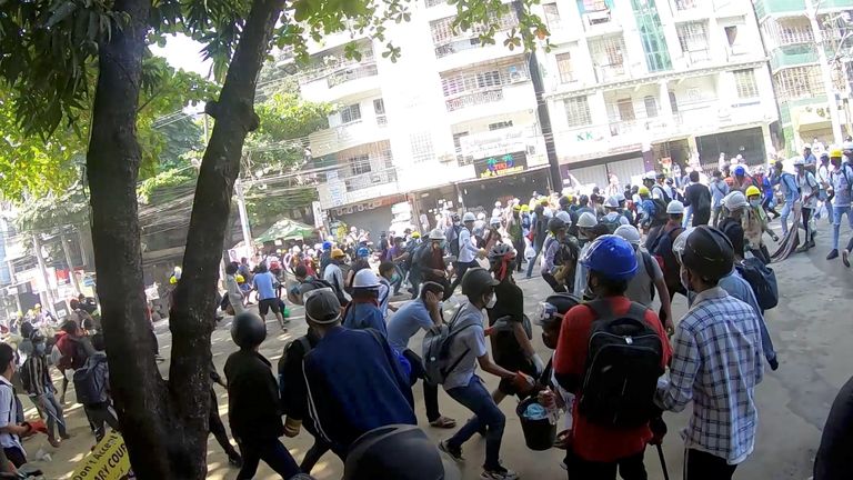 Police used stun grenades and fired shots to try to disperse protesters