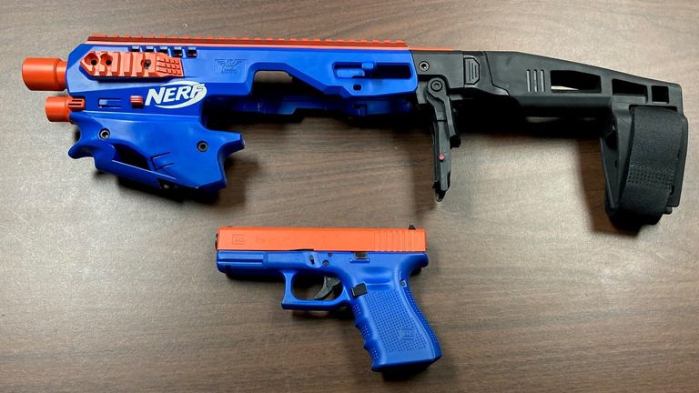 US police on a drugs raid at a house in North Carolina discovered a semi-automatic pistol disguised as a toy Nerf gun. Pic: Catawba County Sheriff&#39;s Office