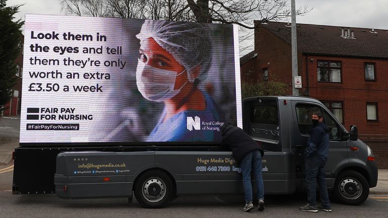 An ad board outside the Salford Royal Hospital, Manchester, by the Royal College of Nursing