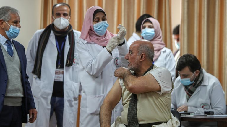 Former Palestinian health minister Jawad Tibi receiving a dose of the vaccine last month