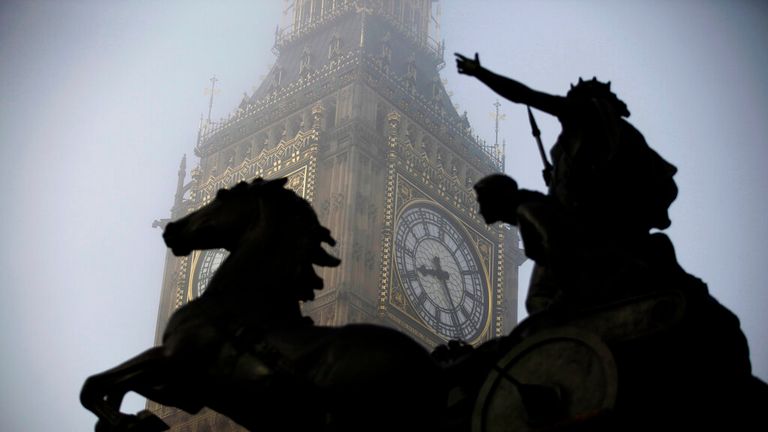 The Boudica statue stands in the foreground as fog shrouds the clock tower which houses the &#39;Big Ben&#39; bell of the Palace of Westminster in London, Thursday, March 15, 2012. (AP Photo/Matt Dunham)


