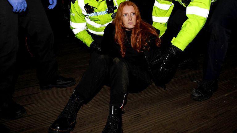 Mandatory Credit: Photo by James Veysey/Shutterstock (11798757t)
A woman is arrested at a vigil in memory of murdered Sarah Everard. Patsy Stevenson
Sarah Everard vigil, Clapham, London, UK - 13 Mar 2021