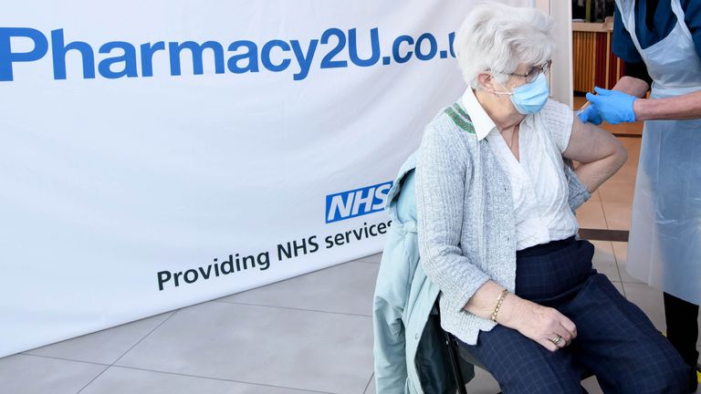 EDITORIAL USE ONLY Christina Watkins, aged 82, from Aylesbury is one of the first people to receive the Oxford/AstraZeneca vaccine at the opening of the first Pharmacy2U Covid-19 vaccination centre at the Odeon Cinema in Aylesbury. 21/1/21