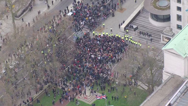 Scotland Yard - hundreds of people outside angry about how police handled the vigil for Sarah Everard