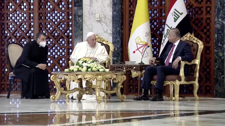 Iraqi Prime Minister Mustafa Al-Kadhimi welcomes Pope Francis as he arrives at Baghdad International Airport to start his historic tour in Baghdad, Iraq, March 5, 2021, in this screen grab taken from video. Iraqiya TV/Reuters TV via REUTERS ATTENTION EDITORS - THIS IMAGE HAS BEEN SUPPLIED BY A THIRD PARTY