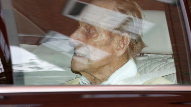 CREDIT AP Britain's Prince Philip leaves the King Edward VII hospital in the back of a car in London, Tuesday, March 16, 2021. The 99-year-old husband of Queen Elizabeth II has been hospitalized after a heart procedure. (AP Photo/Alastair Grant) 