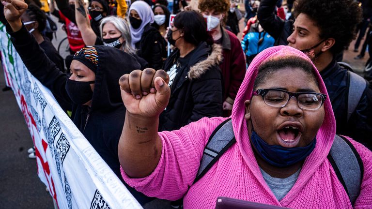 Protesters marched on the first day of the Derek Chauvin trial 