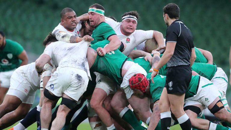 Ireland and England players compete in the scrum during the recent Six Nations game in Dublin. Pic: AP