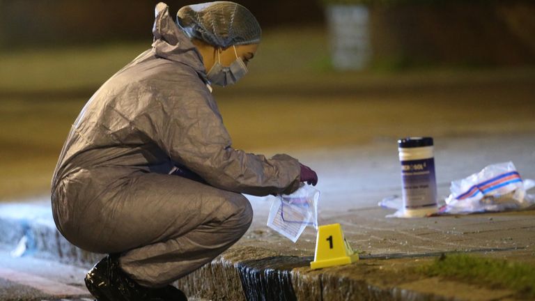 Forensics officers have been examining the area around Poynders Court on Poynders Road on the A205 in Clapham