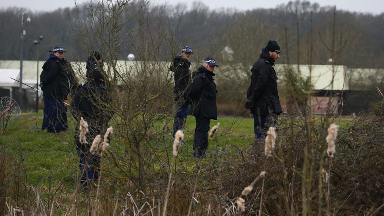 Land near Great Chart Golf and Leisure country club and course in Ashford, Kent, is searched by police officers