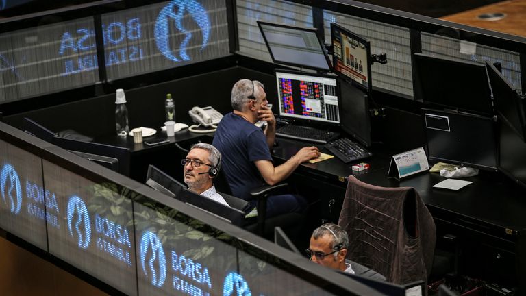 A day after elections, traders work at the Borsa Istanbul (BIST) stock exchange shortly after its opening, in Istanbul, Monday, June 25, 2018. Pic: AP