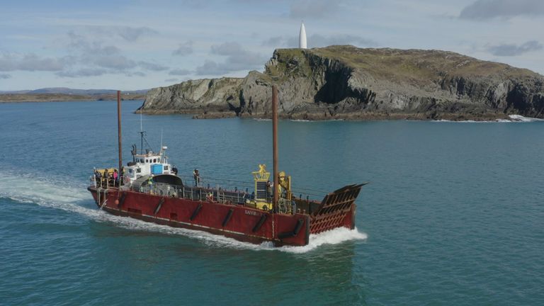 The barge Sabrina II sailing out from Baltimore, Co Cork with the buoy and crew