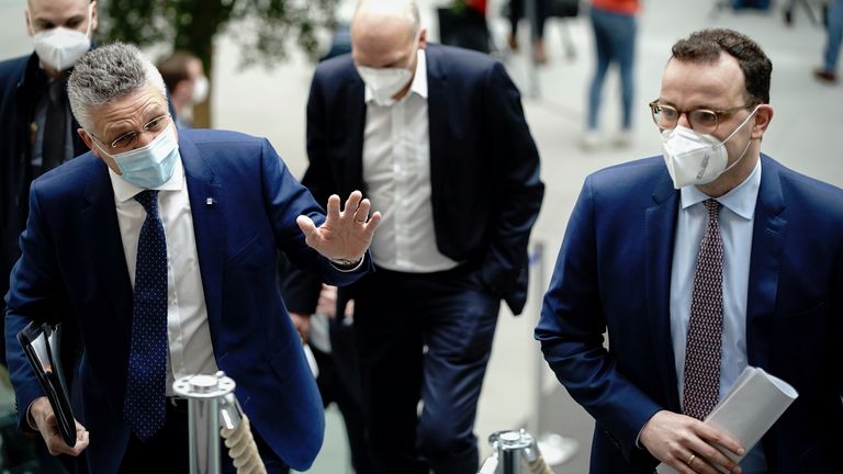 Lothar Wieler (l), President of the Robert Koch Institute and Jens Spahn (CDU,r), Federal Minister of Health, and , arrive for the press conference on the Corona situation before Easter. Photo by: Kay Nietfeld/picture-alliance/dpa/AP Images