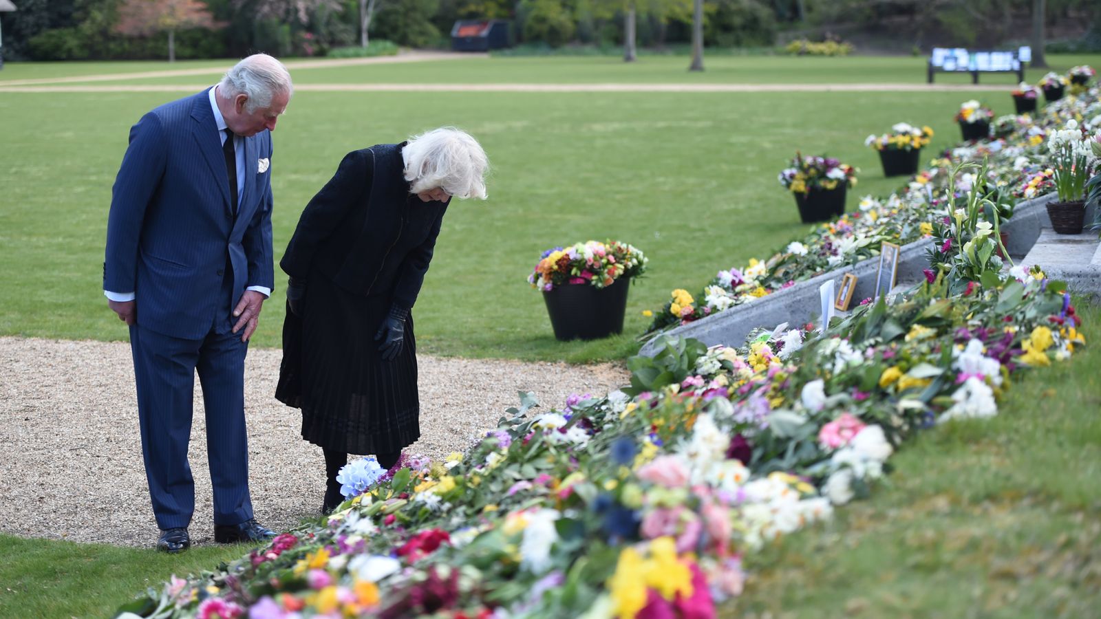 Prince Philip: Charles and Camilla inspect tributes to Duke of ...