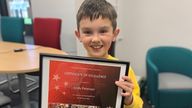 Cody Peterson, an eight-year-old, has been praised for his calmness after he successfully called 999 and guided fire crews to a neighbour&#39;s house that had caught fire in Watford, Hertfordshire.