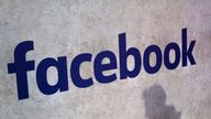 FILE - This Jan. 17, 2017, file photo shows a Facebook logo displayed in a start-up companies gathering at Paris&#39; Station F in Paris. Facebook CEO Mark Zuckerberg will meet Friday May 10, 2019 French President Emmanuel Macron as the tech giant and France try to pioneer ways of fighting hate speech and violent extremism online. (AP Photo/Thibault Camus, File)      