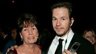 FILE - In this Sunday, Jan. 16, 2005, file photo, Mark Wahlberg, executive producer of the HBO series "Entourage," and his mother Alma pose at the HBO party after the 62nd Annual Golden Globe Awards, in Beverly Hills, Calif. Alma Wahlberg, the mother of entertainers Mark and Donnie Wahlberg and a regular on their reality series ...Wahlburgers..., has died, her sons said on social media Sunday, April 18, 2021. She was 78. ...My angel. Rest in peace,... Mark Wahlberg tweeted. (AP Photo/Lisa Rose, File)