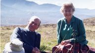 The Queen has released a photo of herself and her husband relaxing in the Scottish Highlands in 2003. Pic: The Countess of Wessex
