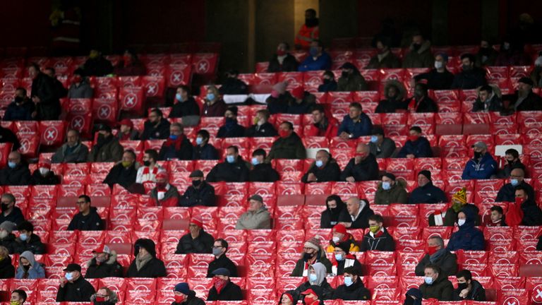 File photo dated 13-12-2020 of Arsenal fans watch their side in the stands during the Premier League match at Emirates Stadium, London.