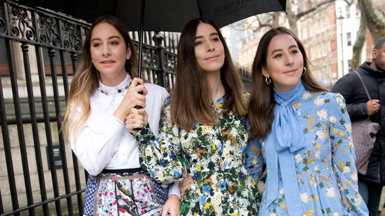 Este Haim, left, Alana Haim, and Danielle Haim of music band Haim arrive before the Erdem Autumn/Winter 2018 London Fashion Week show held at the National Portrait Gallery, London. PRESS ASSOCIATION. Picture date: Monday February 19, 2018. Photo credit should read: Isabel Infantes/PA Wire