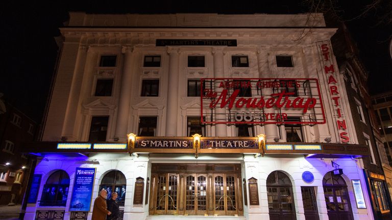 People walk past the closed doors of the St Martin's Theatre London, home to Aghata Christie's 'The Mousetrap', which is the world's longest continuously running play, the day after Prime Minister Boris Johnson ordered theatres, pubs and restaurants across the country to close as the Government announced unprecedented measures to cover the wages of workers who would otherwise lose their jobs due to the coronavirus outbreak.