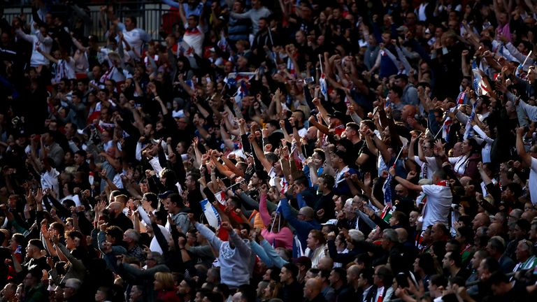 England fans celebrate a disallowed goal in the stands during the Euro 2020 Qualifying Group A match at Wembley Stadium, London.