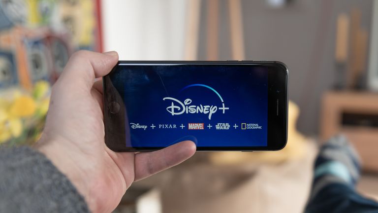 Amsterdam, The Netherlands, 02/03/2020, Disney+ startscreen on  mobile phone. Disney+ online video, content streaming subscription service. Disney plus, Star wars, Marvel, Pixar, National Geographic.