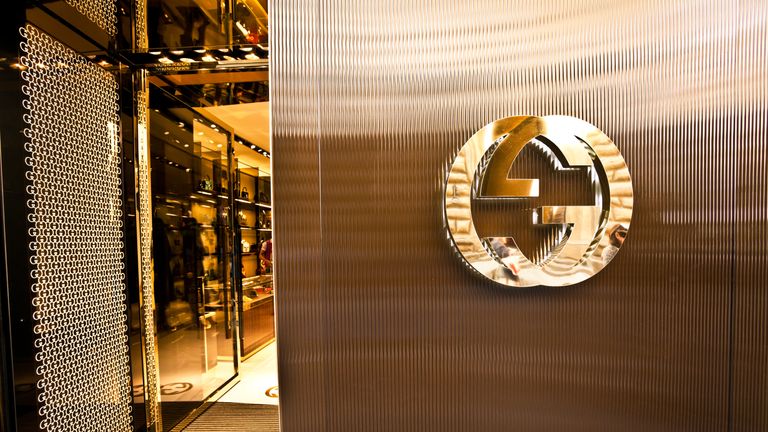 Florence, Italy - October 11, 2011: Entrance of the Gucci store located in Via Condotti near Piazza di Spagna. Gucci is an Italian fashion and leather goods label.