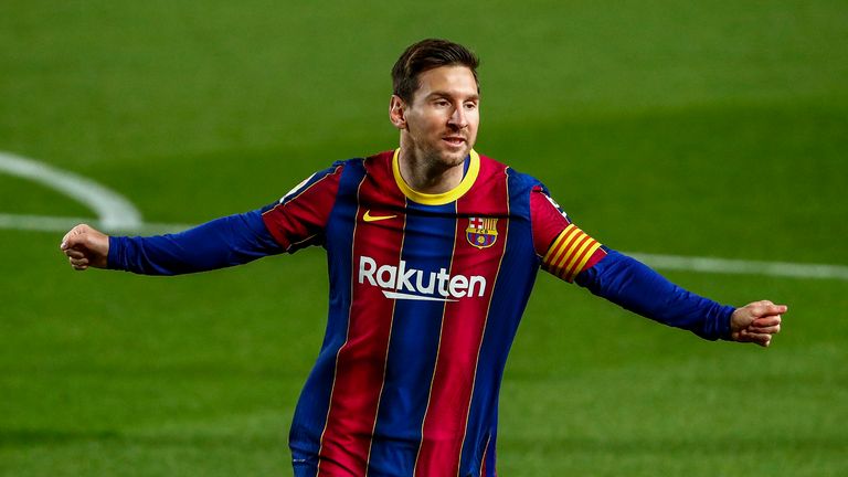 Barcelona&#39;s Lionel Messi celebrates after scoring the opening goal during the Spanish La Liga soccer match between FC Barcelona and Getafe at the Camp Nou stadium in Barcelona, Spain, Thursday, April 22, 2021. 