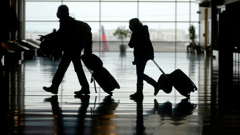 Travelers are shown in Salt Lake City International Airport Tuesday, March 9, 2021, in Salt Lake City. Pic: AP