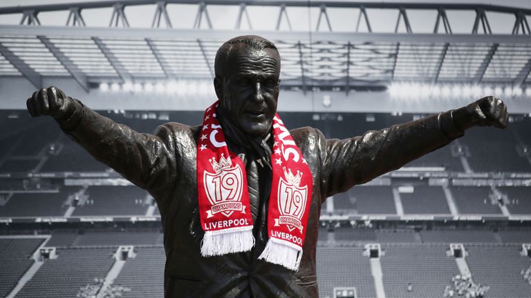 The statue of legendary Liverpool manager Bill Shankly outside Anfield with a team scarf after Liverpool won the Premier League in 2020