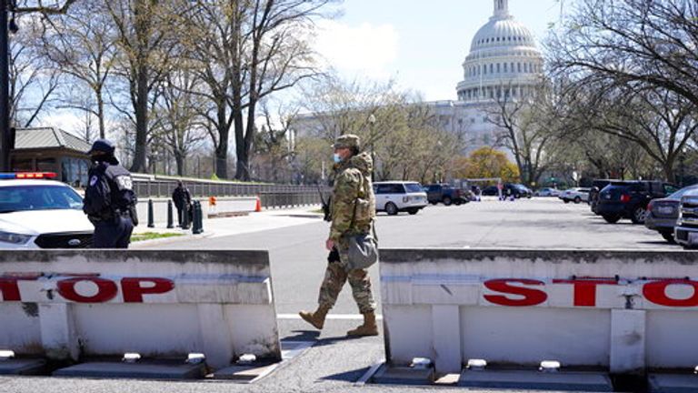 Troops stand guard on Capitol Hill. Pic: AP