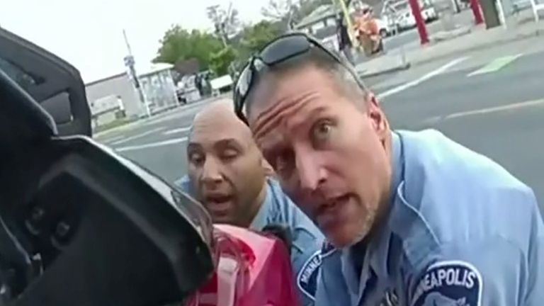 Police officer Derek Chauvin looks up while George Floyd (not in picture) was below him during his arrest on May 25, 2020 in a police body camera video played in court on the third day of the trial of former Minneapolis police officer Derek Chauvin for second-degree murder, third-degree murder and second-degree manslaughter in the death of George Floyd in Minneapolis