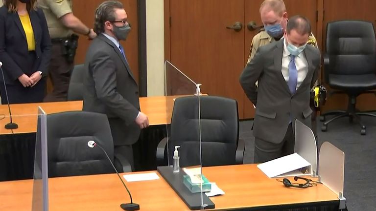 Former Minneapolis police officer Derek Chauvin is handcuffed to be led away after a jury found him guilty of all charges in his trial for second-degree murder, third-degree murder and second-degree manslaughter in the death of George Floyd in Minneapolis, Minnesota, U.S. April 20, 2021 in a still image from video. Pool via REUTERS