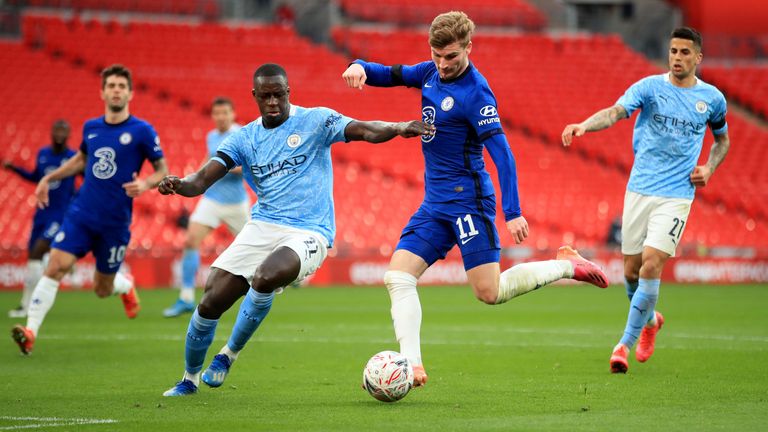 Soccer Football - FA Cup Semi Final - Chelsea v Manchester City - Wembley Stadium, London, Britain - April 17, 2021 Manchester City&#39;s Benjamin Mendy in action with Chelsea&#39;s Timo Werner Pool via REUTERS/Adam Davy