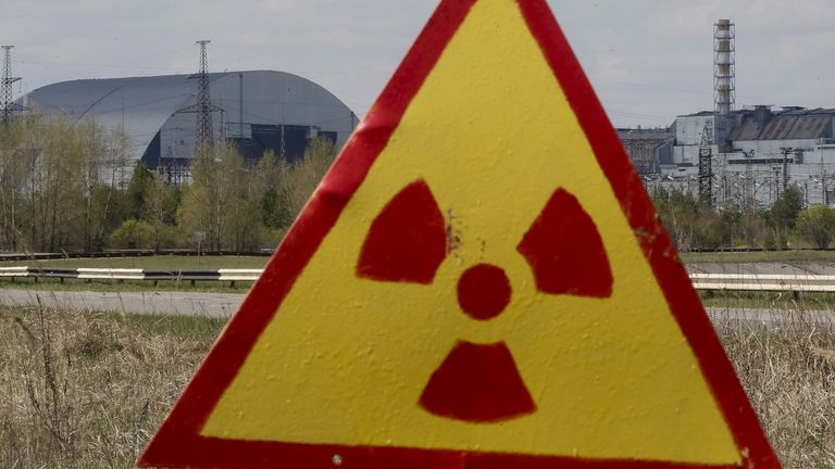 A general view shows the New Safe Confinement (NSC) structure (left) at the site of the Chernobyl nuclear power plant, northern Ukraine