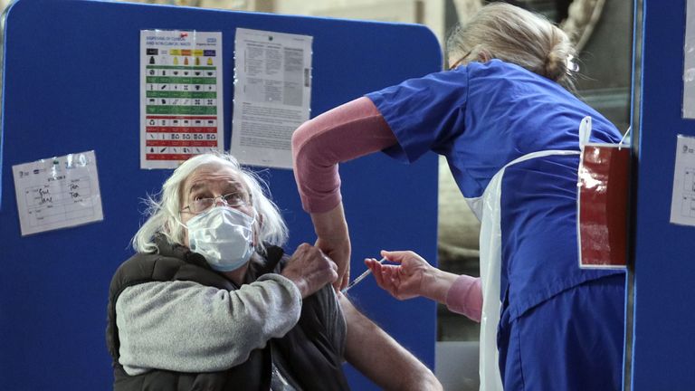 Embargoed to 0001 Monday March 29 A man receives an injection of the coronavirus vaccine at Salisbury Cathedral, Wiltshire. Vacinations are continuing to be carried out in the cathedral and some patients are now reaching their second dose. Picture date: Saturday March 27, 2021.