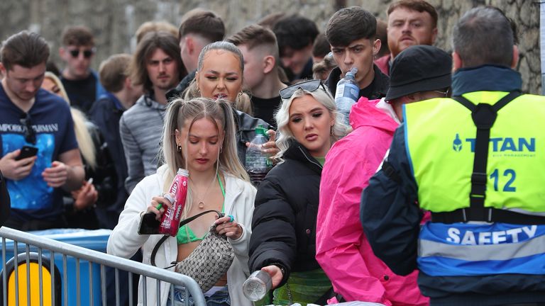 Revellers arrive at Circus nightclub in Bramley-Moore Dock, Liverpool