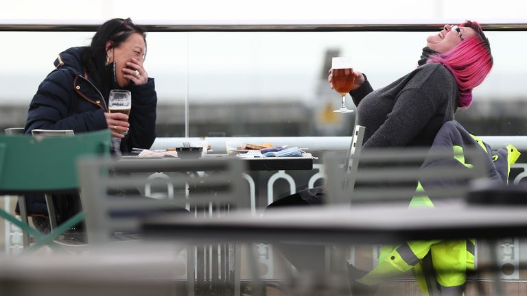 Pippa Ingram, 51, and Sue Bell, 55, were two of the first customers at the UK's biggest pub, the Royal Victoria Pavilion in Ramsgate, Kent. Sipping her pint, Ms Ingram said: 'Absolutely delicious'