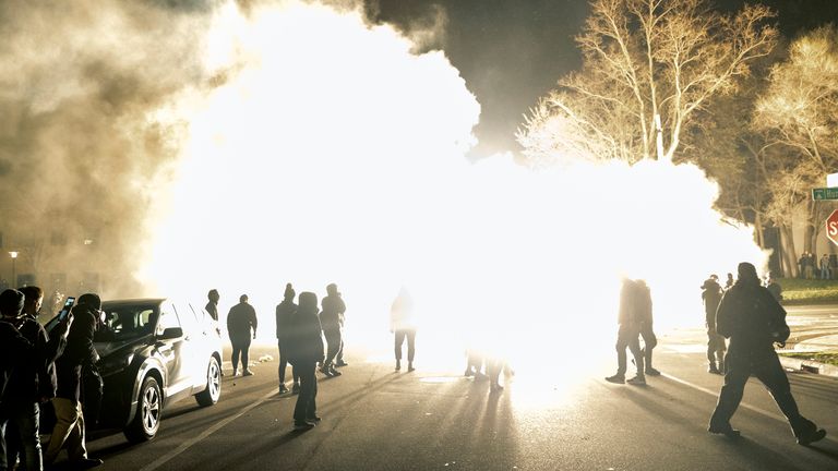 Flash grenades were used to disperse the crowds. Pic: AP