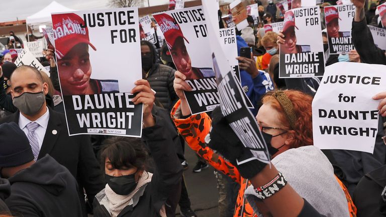 Protesters at Monday&#39;s demonstration held pictures of the 20-year-old