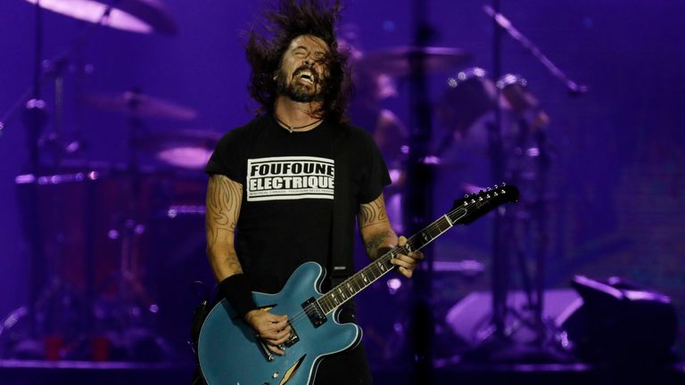 Dave Grohl of the band Foo Fighters performs at the Rock in Rio music festival in Rio de Janeiro, Brazil, Sunday, Sept. 29, 2019. (AP Photo/Leo Correa)