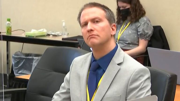 Minneapolis police Officer Derek Chauvin listens, without his face mask, as his defence attorney Eric Nelson gives closing arguments